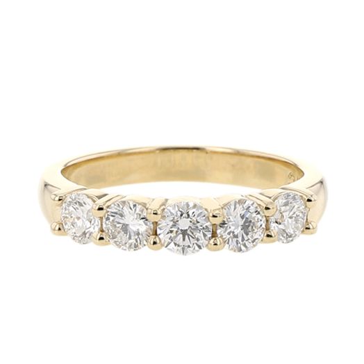 yellow gold band with five round cut diamonds