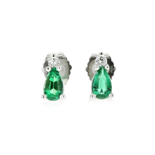 Emerald pear cut earrings with diamonds