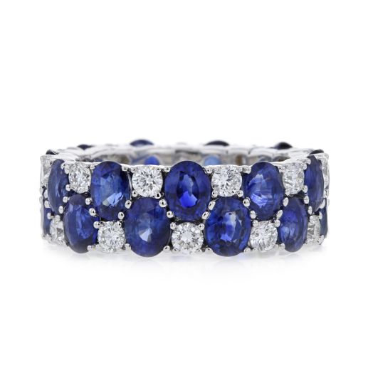 white gold band with alternating oval cut blue sapphires and round diamonds