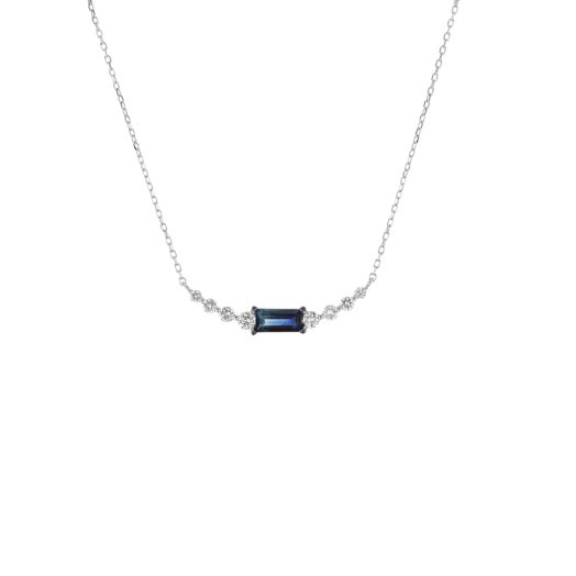 white gold necklace with graduated diamonds and a baguette blue sapphire