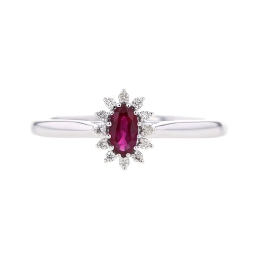 white gold band with slim oval cut ruby center stone in diamond halo