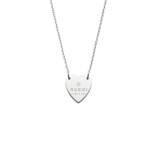 sterling silver necklace with heart shaped pendant inscribed with Gucci trademark