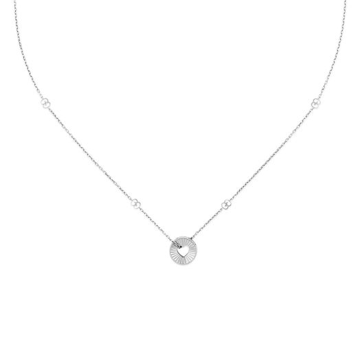 white gold necklace with cut out heart pendant