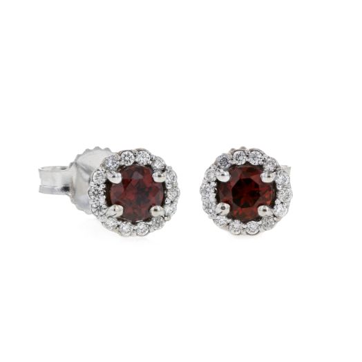 white gold stud earrings with garnet rounds and diamond halos
