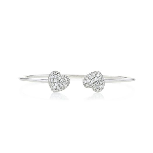 White gold open cuff style bracelet with two diamond hearts