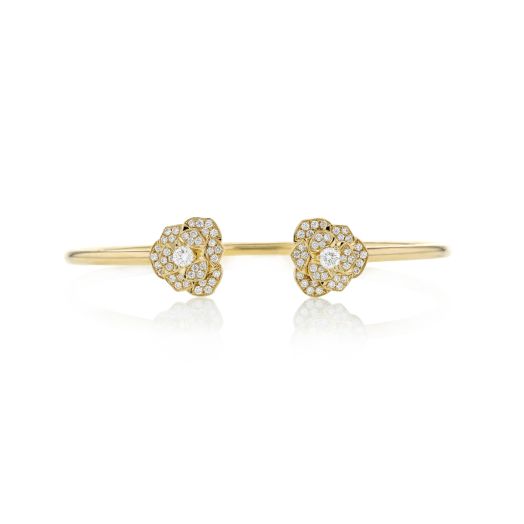 Yellow gold open bangle with flower diamond ends