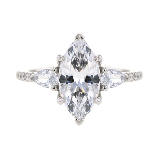 engagement ring setting with marquise shaped center stone and two pear-cut stones on each side