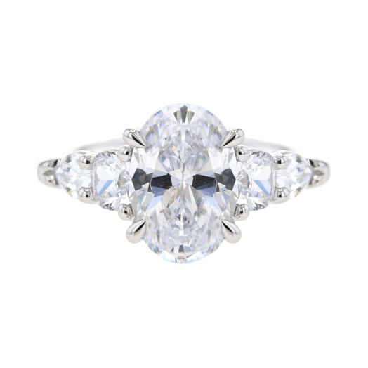 engagement ring setting with five-stones and oval cut center stone