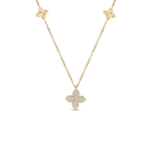 yellow gold necklace with smooth flower stations, and a diamond accented flower pendant