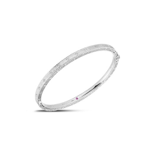 white gold bangle with diamond accents