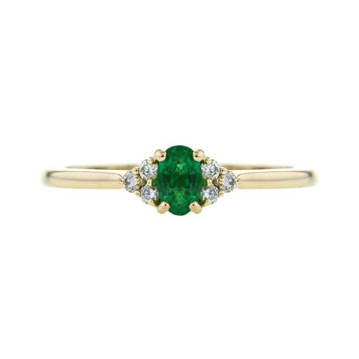 Emerald and diamond ring on a yellow gold band