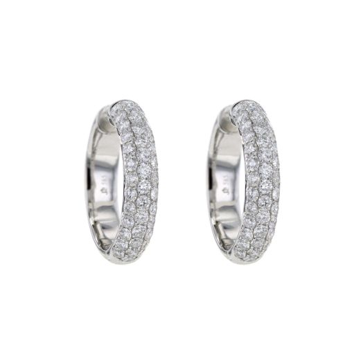 white gold hoop earrings lined with three rows of white diamond rounds