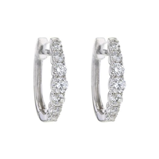 White gold hoop earrings with graduating diamonds for a tapered effect