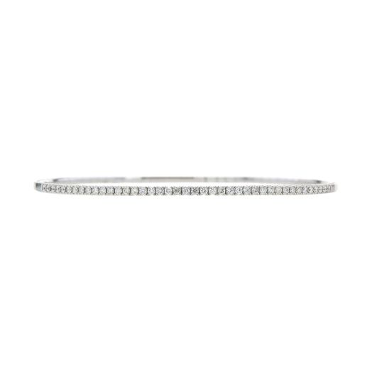 thin white gold bracelet lined with white diamond rounds