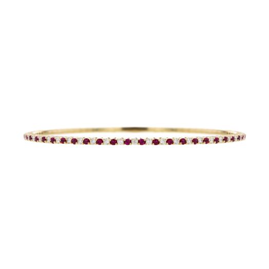 thin yellow gold band lined with alternating round-ciut diamond and rubies