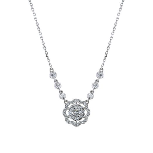white gold link necklace with cluster diamond pendant set in floating flower halo of white diamond rounds, three bezel stations line each side of necklace