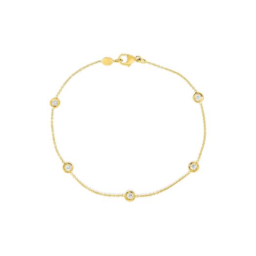 yellow gold bracelet with five bezel-set station diamonds