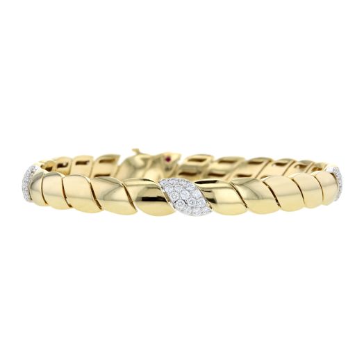 yellow gold bracelet with three stations accented with diamonds