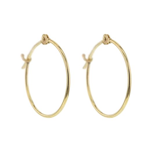 Slim yellow gold hoop earrings