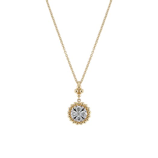 yellow gold beaded mini medallion pendant with diamond accents in center, suspended from yellow gold chain