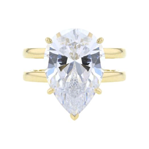 pear-cut center stone set on double yellow band