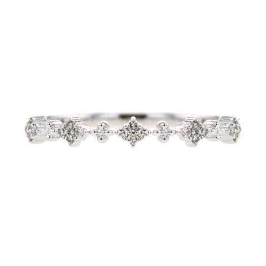 thin white gold band lined with alternating floral clusters of white diamond rounds and beaded design