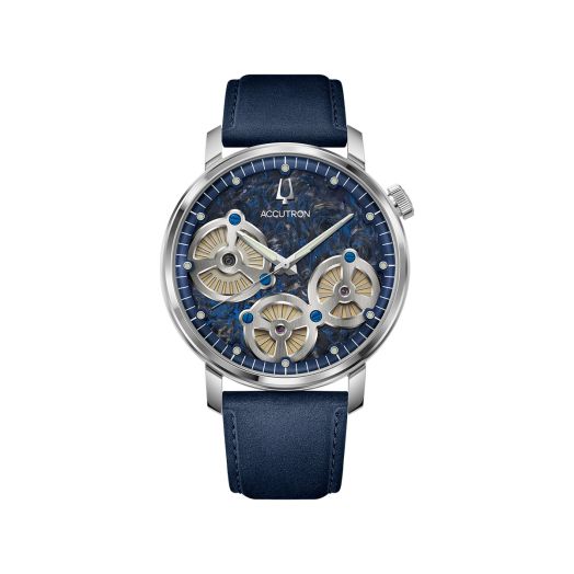 Accutron watch with a blue and silver dial a blue suede strap