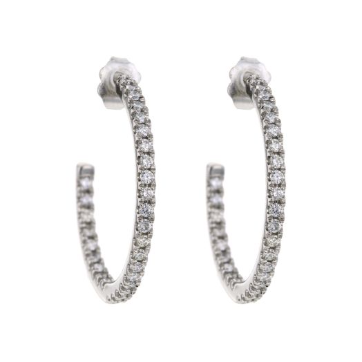 white gold j-hoop earrings lined with diamonds on the exterior and interior of each hoop