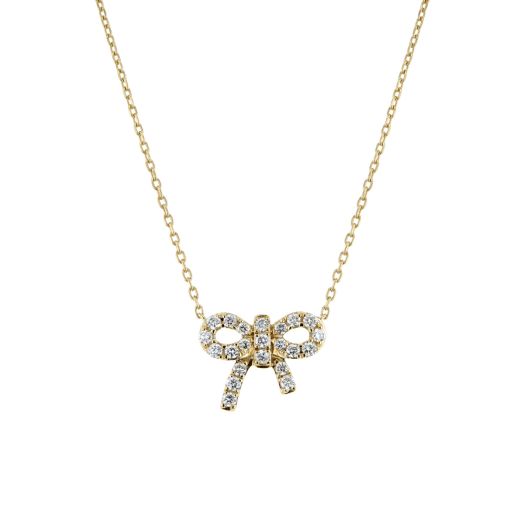 diamond lined mini bow pendant set on yellow gold chain
