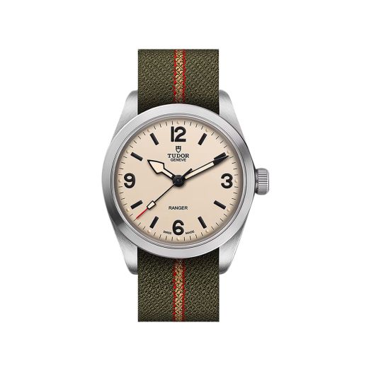tudor watch with beige dial and green strap