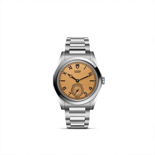 tudor watch with champagne colored dial