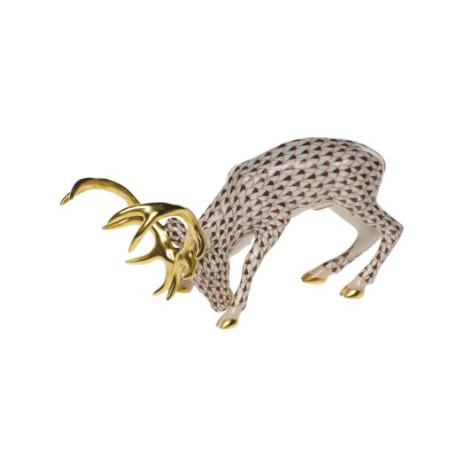 stag figurine with brown fishnet pattern and golden antlers