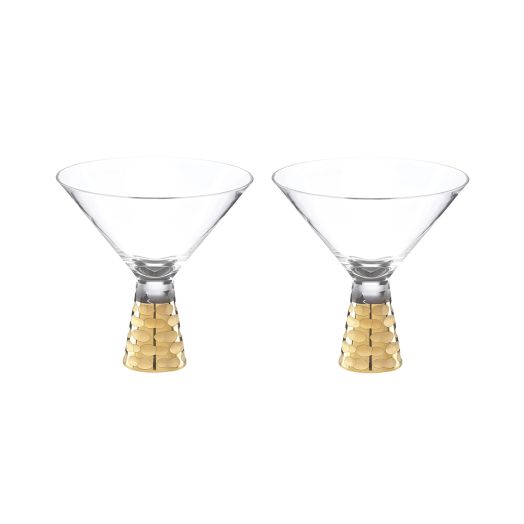 two martini glasses with golden bottoms