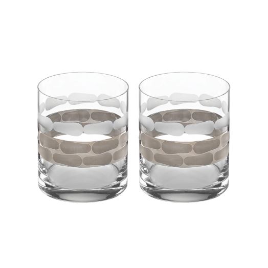 two old fashioned glasses with dotted design