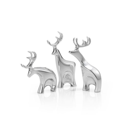 three alloy reindeer figures