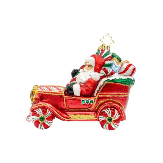 Ornament of santa driving a car