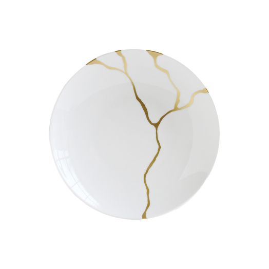 white porcelain plate with irregular gold veining across the surface