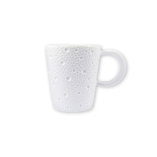 White Limoges porcelain mug with a matte wide rim and delicate wave‑like engraving on the exterior