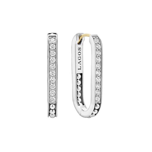elonged silver hoop earrings lined with diamonds
