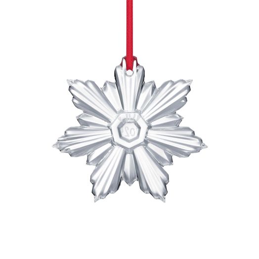 clear snowflake ornament suspended from red string