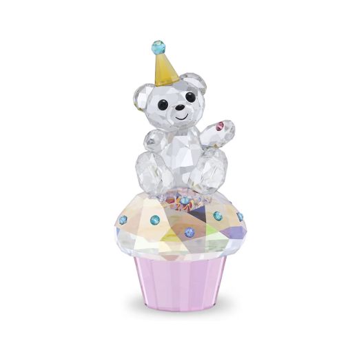cystal bear sitting on top of birthday cupcake figurine
