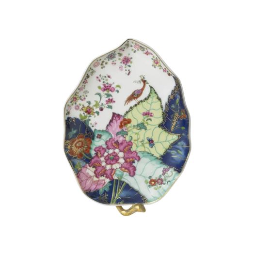 Hand-painted porcelain candy dish featuring the Tobacco Leaf pattern with vibrant colors and 22K gold accents, shaped like a tobacco leaf.