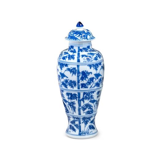 Covered Jar showcasing detailed bamboo illustrations in cobalt blue on a white porcelain background