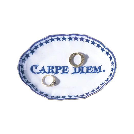 porcelain tray with scalloped edge and the inscription "Carpe Diem," featuring a blue star border