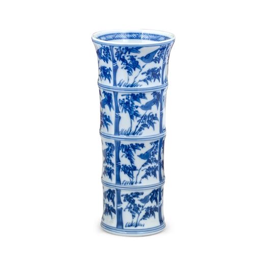 Vase showcasing a cylindrical porcelain body with detailed blue bamboo illustrations on a white background