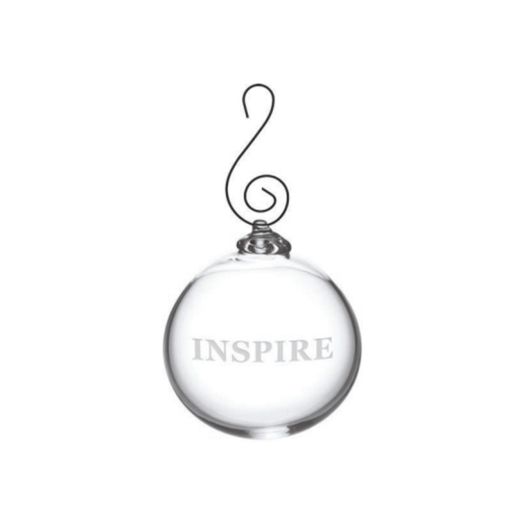 glass ornament with the word "inspire" written 