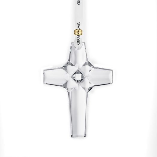 crystal cross shaped ornament suspended from white ribbon