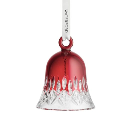 red and clear crystal bell ornament suspended from white ribbon