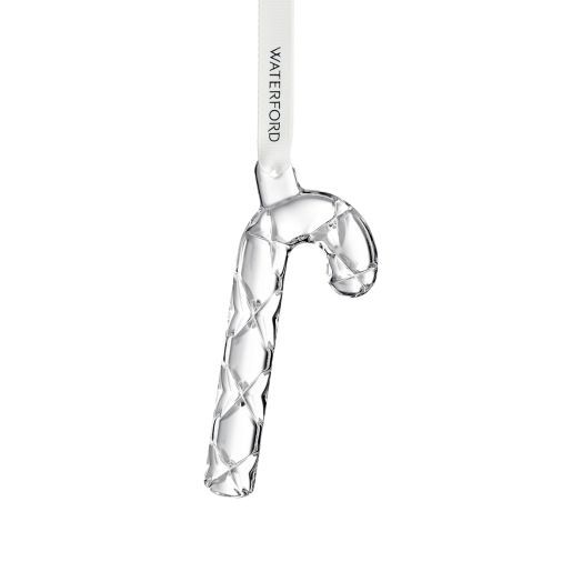 candy cane ornament suspended from white ribbon