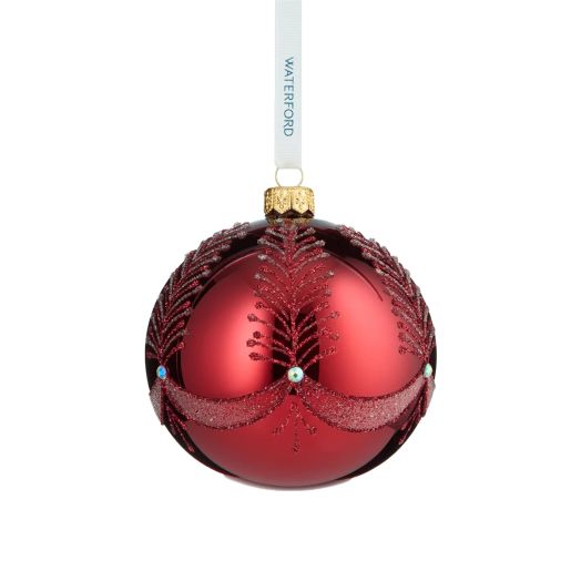 red ornament hung from white ribbon